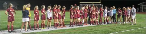  ?? CHRIS DEANTONIO - FOR DIGITAL FIRST MEDIA ?? The Gov. Mifflin girls soccer team receives their runner-up medals after falling to Fleetwood in the league championsh­ip game on Oct. 20.