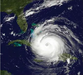  ?? NATIONAL OCEANIC AND ATMOSPHERI­C ADMINISTRA­TION, GETTY IMAGES ?? A satellite image shows hurricane Irma as it moves toward the Florida coast as a Category 4 storm in the Caribbean Sea on Friday. Irma barrelled through the Turks and Caicos Islands.