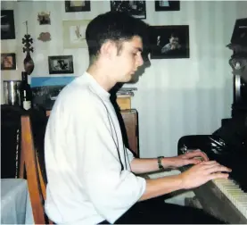  ??  ?? A young Kieran Quinn practising piano.