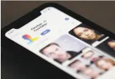  ?? Jenny Kane / Associated Press ?? FaceApp, displayed on an iPhone, can offer users a look at their older selves by processing photos in the cloud. It has raised questions about privacy.