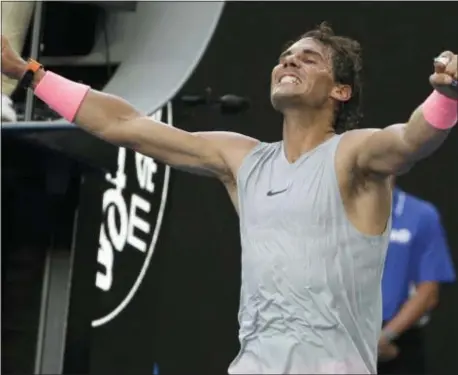  ?? THE ASSOCIATED PRESS ?? Spain’s Rafael Nadal celebrates after defeating Argentina’s Diego Schwartzma­n in their fourth round match at the Australian Open.