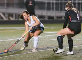  ?? JOHN GILLIS/FOR BALTIMORE SUN MEDIA ?? Westminste­r’s Miranda Moshang, left, passes the ball as Crofton’s Abbey Jeffries closes in during Wednesday’s Class 3A state semifinal against Westminste­r at Glen Burnie.