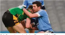  ??  ?? Seán Cavanagh consoles Andrew Glennon of Michael Glaveys