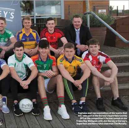  ??  ?? Captains and representa­tives of the teams that will take part in the Garvey’s SuperValu County SFC at the competitio­n’s formal launch at the Tralee Bay Wetlands with Jim Garvey of Garvey’s SuperValu and Kerry GAA chairman Tim Murphy.