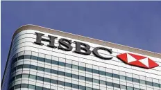  ?? Reuters ?? The HSBC bank logo is seen in the Canary Wharf financial district in London, Britain.