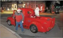  ?? GENE WALSH — DIGITAL FIRST MEDIA ?? Santa arrives in a truck from the Pottstown Classic Car Club for the Hometown Holiday celebratio­n at Smith Family Plaza in Pottstown last December.