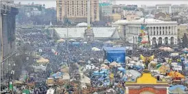  ??  ?? Scores of anti-government protesters gather at the Independen­ce Square in Kiev on Sunday. REUTERS