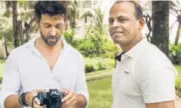  ??  ?? Hrithik with photograph­er Charles Neves Rao