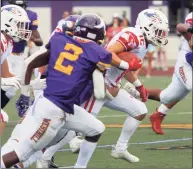  ?? Christian Abraham / Hearst Connecticu­t Media ?? Greenwich’s George Vomvolakis carries the ball against Westhill in Stamford on Saturday.