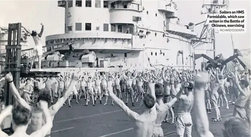  ?? RICHARD EDSER/PA ?? Sailors on HMS Formidable, which saw action in the Battle of
Okinawa, exercising