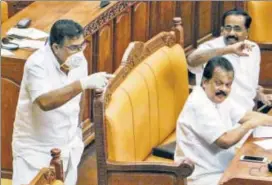  ?? PTI ?? IUML legislator Parakkal Abdulla attends a Kerala assembly session on Monday while wearing a mask and gloves, a move which drew criticism from the state’s ruling Left Democratic Front (LDF).