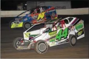  ?? RICK KEPNER - FOR DIGITAL FIRST MEDIA ?? Doug Manmiller (44) and Ryan Watt (14) duel during action at Grandview Speedway on April 21.