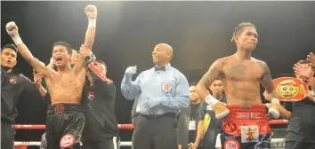  ?? PAUL JUN E. ROSAROSO ?? Jonas ‘Zorro’ Sultan of the ALA Gym celebrates after winning by lopsided unanimous decision over former two-division champion Johnriel ‘Quadro’ Alas Casimero in their IBF junior bantamweig­ht title eliminator the other night at the Waterfront-Cebu City...