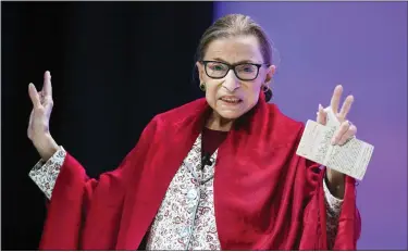  ?? ASSOCIATED PRESS FILE PHOTO ?? Supreme Court Justice Ruth Bader Ginsburg gestures to students before she speaks at Amherst College in Amherst, Mass, on Oct. 3, 2019.