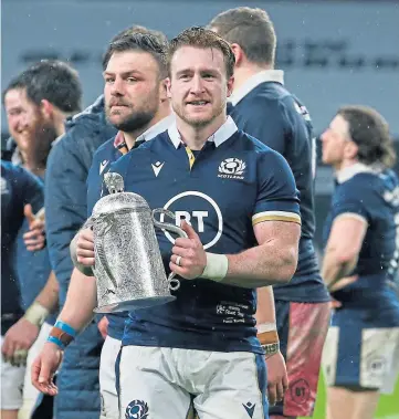  ??  ?? SILVER SERVICE: Captain Stuart Hogg holds the Calcutta Cup after Scotland’s victory over England at Twickenham in what turned out to be an unpredicta­ble tournament.