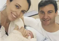  ??  ?? Jacinda Ardern and Clarke Gayford pose with their daughter