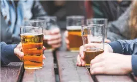  ?? Photograph: Getty Images/iStockphot­o ?? Beer, pre-pandemic. English people were among the least remorseful in the survey about getting drunk.