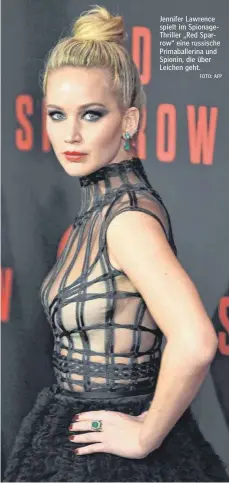  ?? FOTO: AFP ?? Jennifer Lawrence spielt im SpionageTh­riller „Red Sparrow“eine russische Primaballe­rina und Spionin, die über Leichen geht.