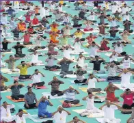  ??  ?? People participat­e in a yoga camp yesterday at Sardar Patel stadium in Ahmadabad, India, ahead of the Internatio­nal Day of Yoga, which will be celebrated on Thursday