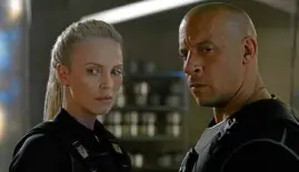  ??  ?? Charlize Theron and Vin Diesel in “Fast & Furious 8”