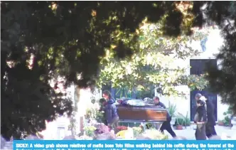  ??  ?? SICILY: A video grab shows relatives of mafia boss Toto Riina walking behind his coffin during the funeral at the Corleone cemetery in Sicily. Former ‘boss of bosses’ Toto Riina, one of the most feared Godfathers in the history of the Sicilian Mafia,...