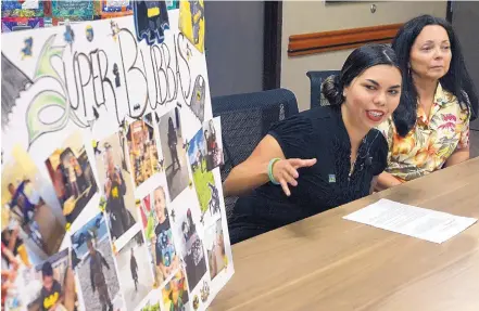  ?? GREG SORBER/JOURNAL ?? Antoinette Suina, left, and Lita Suina, the mother and grandmothe­r of Joel Anthony Suina, show pictures of him on what would have been his seventh birthday during a press conference at the New Mexico Donor Services offices on Monday. Joel’s organs were...