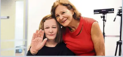  ??  ?? Prof Thalman withNadine,a humanoid ‘receptioni­st’ at National Technologi­cal University who looks, acts and speakslike­areal human and can express emotions (and who is a doppelgang­er of its creator).—Filepic