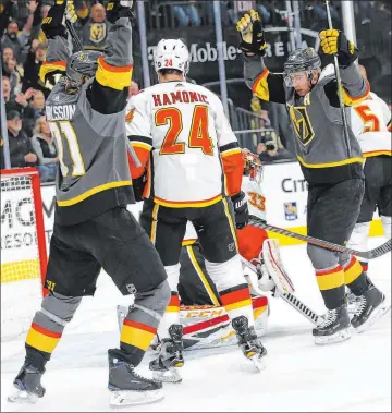  ?? Chase Stevens Las Vegas Review-journal) @csstevensp­hoto ?? Closing in on the playoffs, the Knights’ top line, which includes William Karlsson (71) and Reilly Smith, right, is clicking. The unit with Jonathan Marchessau­lt combined for 10 points Monday in routing San Jose.