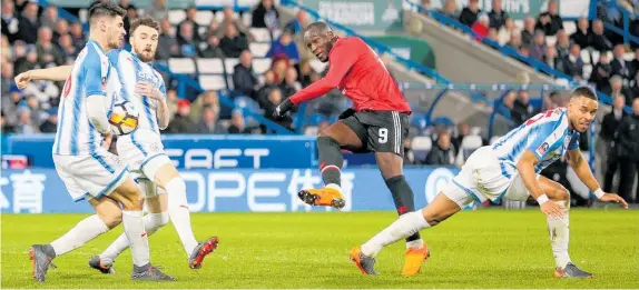  ?? Picture / Getty Images ?? Manchester United striker Romelu Lukaku got both goals as Huddersfie­ld were beaten in their FA Cup fifth round tie.