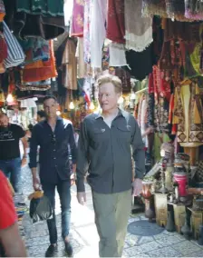  ?? (Courtesy) ?? AMERICAN TALK SHOW host Conan O’Brien walks through the Arab shuk in Jerusalem’s Old City.