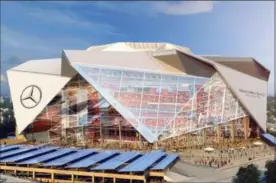  ?? ASSOCIATED PRESS FILE PHOTO ?? Roof constructi­on has delayed opening Atlanta’s $1.5-billion Mercedes Benz Stadium.