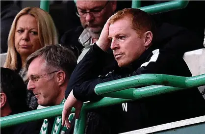  ??  ?? SILVER LINING: Lennon languishes in the stand but he saw enough fight in his side to believe they can recover against Brondby