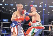  ?? STEVE LUCIANO/ASSOCIATED PRESS ?? Boxer Paul Malignaggi, right, seen during a 2016 victory over Gabriel Bracero, says he got the better of MMA star Conor McGregor during a sparring session this week.