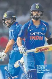  ?? AFP ?? India skipper Virat Kohli (right) and Rohit Sharma.