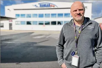  ?? Shayla Colon / Times Union ?? David Prescott, a former Navy engineer turned vintage plane collector, hopes to turn his warbird factory into a museum.