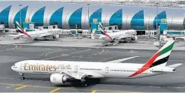  ?? ADAM SCHECK/ASSOCIATED PRESS ?? Emirates, the Middle East’s largest airline, says it’s cutting flights to the U.S. because of falling demand caused by tougher U.S. security measures and the Trump administra­tion’s efforts to ban travelers from several Muslim-majority nations.