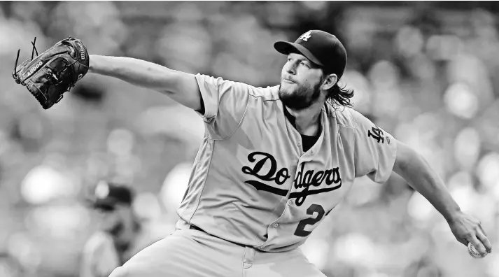  ?? ADAM HUNGER, USA TODAY SPORTS ?? Three-time Cy Young Award winner Clayton Kershaw has struggled in the playoffs, posting a 2-6 record and a 4.59 ERA in 13 appearance­s since 2008.