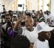  ?? MATIAS DELACROIX AP ?? A man yells for justice during a memorial service for assassinat­ed Haitian President Jovenel Moïse in the Cathedral of Cap-Haitien, Haiti, on July 22. Moïse was killed in his home in Port-au-Prince on July 7.