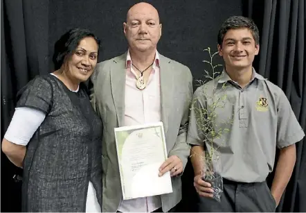  ??  ?? Thor Hilmarsson (centre) with family Vera MacDonald and Jobe-Ray Fitzgerald celebrate his new citizenshi­p.