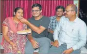  ?? HT ?? ■ Amit Shukla (second from left) with his parents.