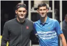  ?? JULIAN FINNEY/GETTY IMAGES ?? Roger Federer, left, will play Novak Djokovic for the 50th time, this time in the Australian Open semifinals.