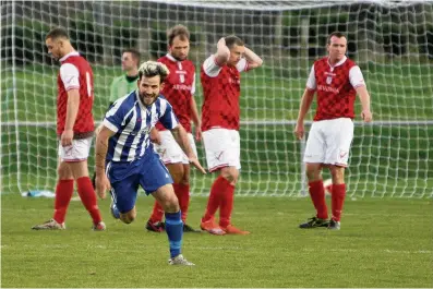  ?? Pic: Richard Birch ?? Holyhead’s Jay Gibbs celebrates scoring a last minute of extra time winner from a free kick.