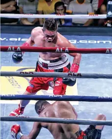  ?? ALEX BADAYOS/SS-CEBU ?? Former WBO Internatio­nal Super Lightweigh­t Champion Jason "El Nino" Pagara from Maasin City, Philippine­s in red trunks, celebrates after defeating his opponent Wellem Reyk of Bogor, Indonesia in the 3rd round during the Pinoy Pride 44 held in Maasin...