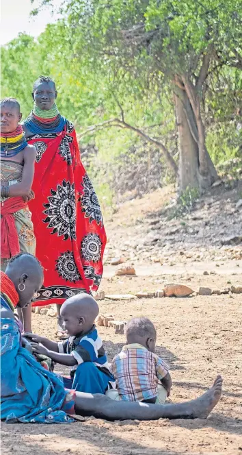  ?? PICTURES Chris Watt ?? Mothers of the children attending Kakore School in Turkana wearing traditiona­l dress