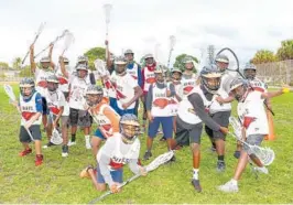  ?? COURTESY ?? The McNicol Hawks lacrosse team is an integral part of the R.A.I.S.E. The Bar program.