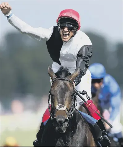  ??  ?? Popular jockey Frankie Dettori claims his second Epsom Derby victory on board Golden Horn two years ago.