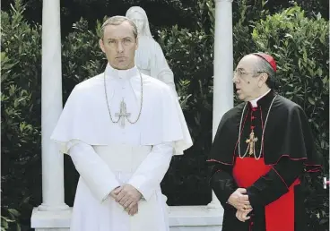  ?? GIANNI FIORITO / HBO VIA AP ?? Jude Law, left, and Silvio Orlando in The Young Pope.