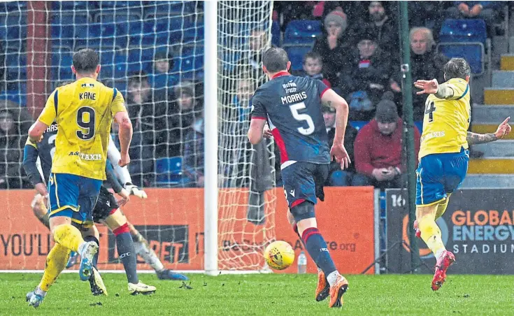  ?? Pictures: SNS. ?? Stevie May fires St Johnstone ahead in Dingwall as Tommy Wright’s men extend their unbeaten Premiershi­p run; the striker celebrates with team-mates, right.