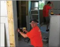  ?? SUBMITTED PHOTO ?? As part of Voya Financial’s National Day of Service, Tony Brantzeg volunteers at Habitat for Humanity in Coatesvill­e.