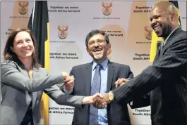  ?? PICTURE: THOBILE MATHONSI ?? Economic Developmen­t Minister Ebrahim Patel (centre) shakes hands with Dr Geraldine Reymenants, the general representa­tive of the government of Flanders, and Dr Joni Toko Musabayana, director of the decent work team, after signing a memorandum of...
